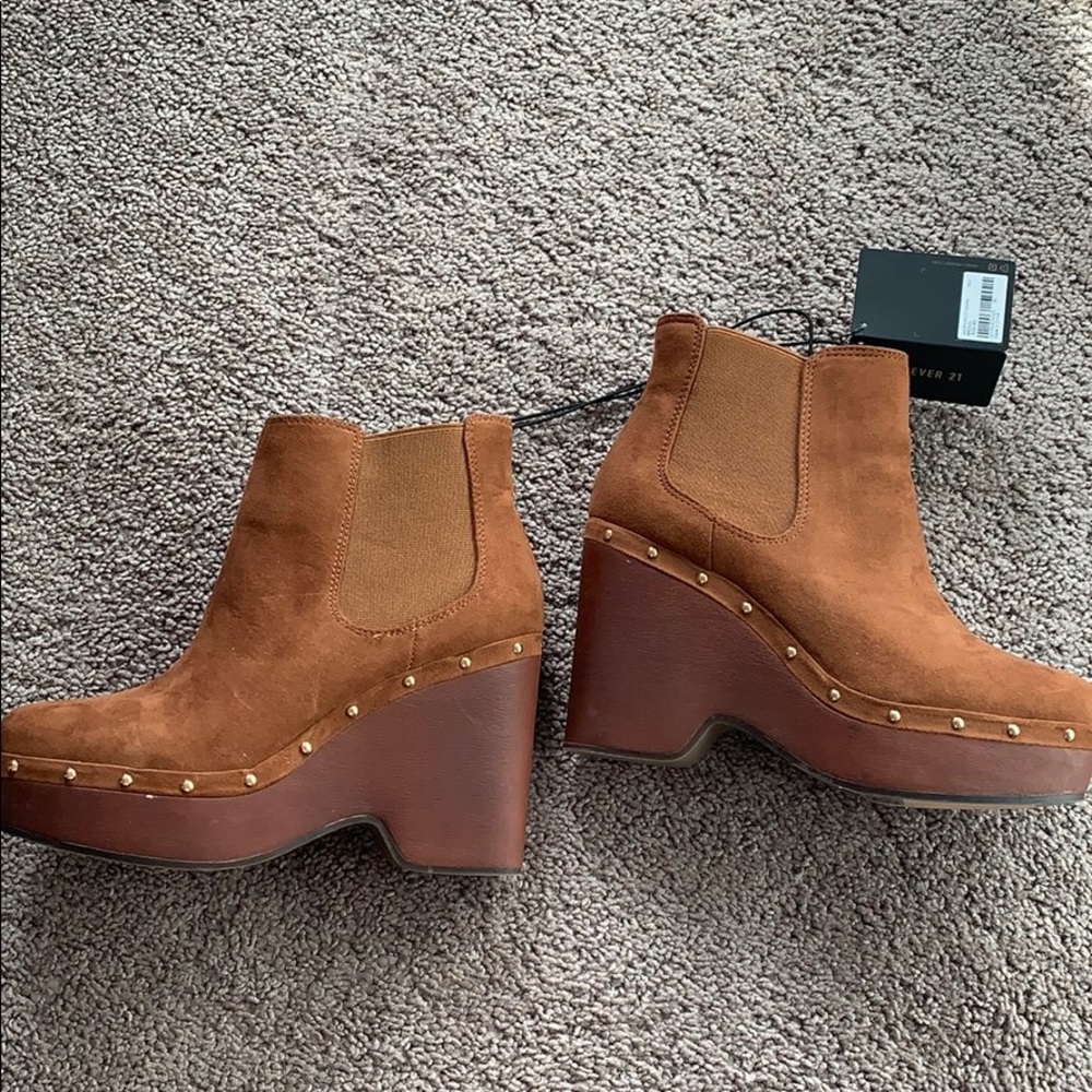 Sold!!wedge boots! Never worn . Took tags off
